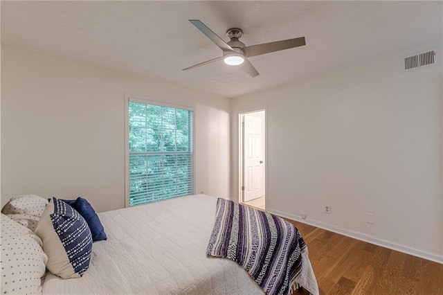 3135 Seven Pines Ct Unit 201, Atlanta, GA 30339 - bedroom featuring wood finished floors and a ceiling fan