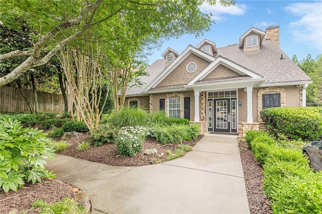 3135 Seven Pines Ct Unit 201, Atlanta, GA 30339 - view of front of house with roof with shingles, a chimney, and stone siding