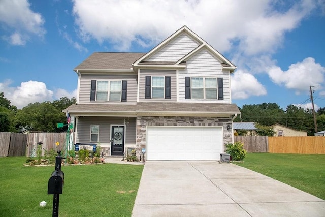 craftsman house with a front lawn and a garage