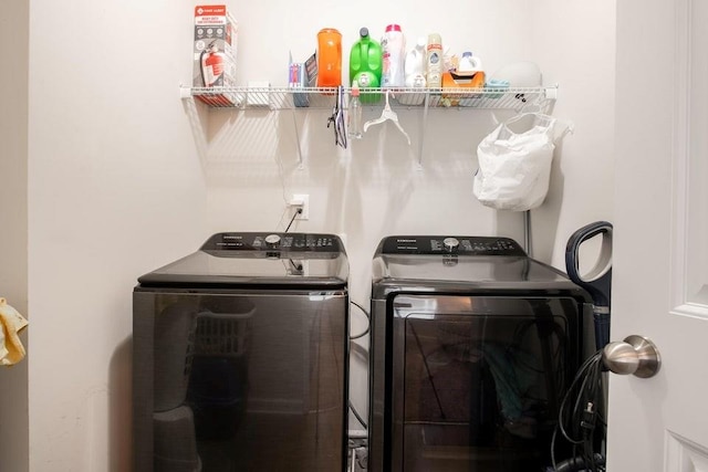 laundry area featuring washing machine and dryer