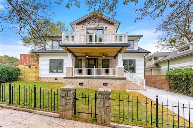 view of front of house with a porch, a front lawn, and ceiling fan