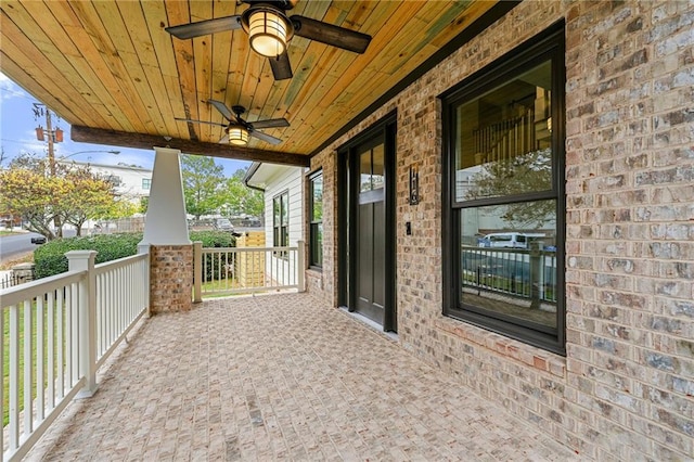 view of patio featuring ceiling fan and covered porch