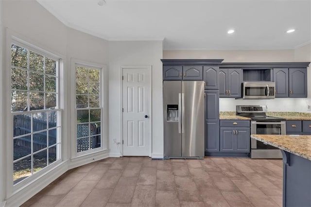 kitchen featuring stainless steel appliances, recessed lighting, ornamental molding, and light stone counters