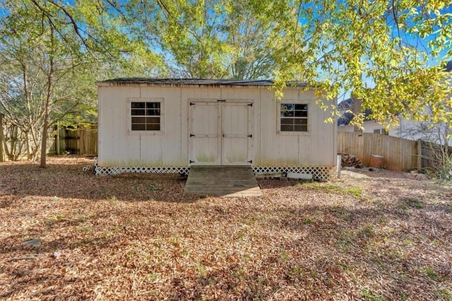 view of shed featuring a fenced backyard