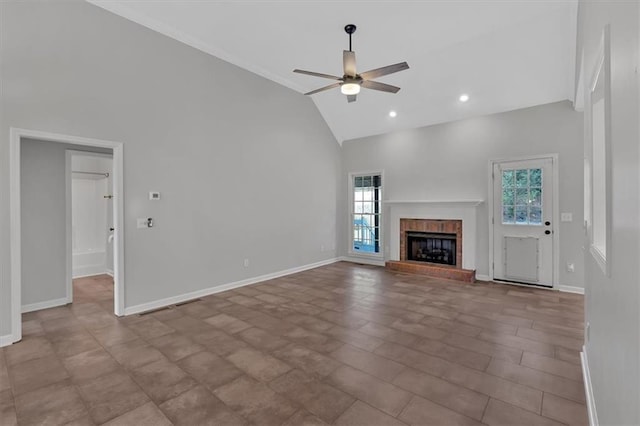 unfurnished living room with high vaulted ceiling, recessed lighting, a fireplace, a ceiling fan, and baseboards