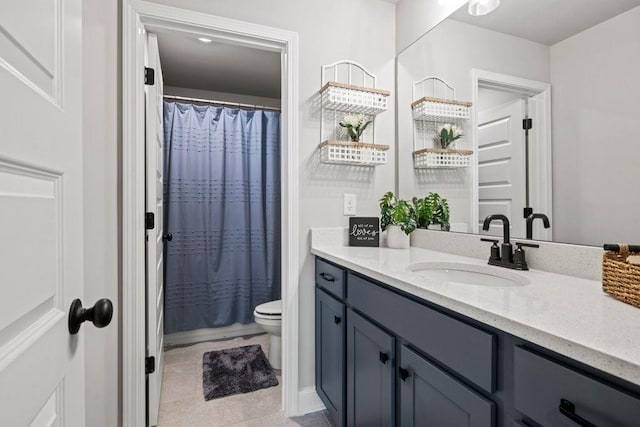 bathroom with curtained shower, tile patterned flooring, vanity, and toilet