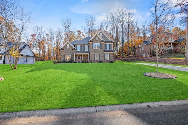 view of front of home featuring a front yard