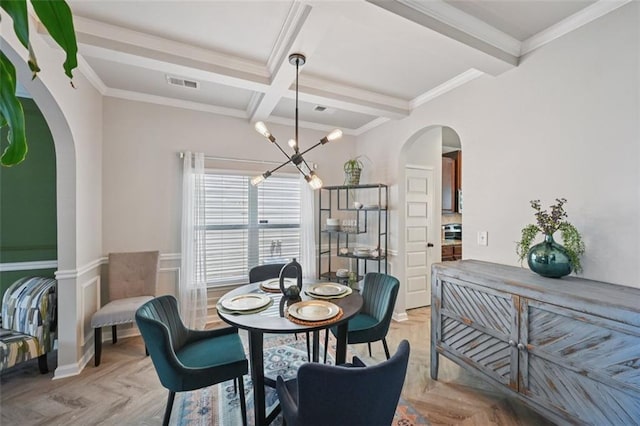 7530 Springbox Dr, Fairburn, GA 30213 - dining space with arched walkways, a chandelier, ornamental molding, beamed ceiling, and coffered ceiling