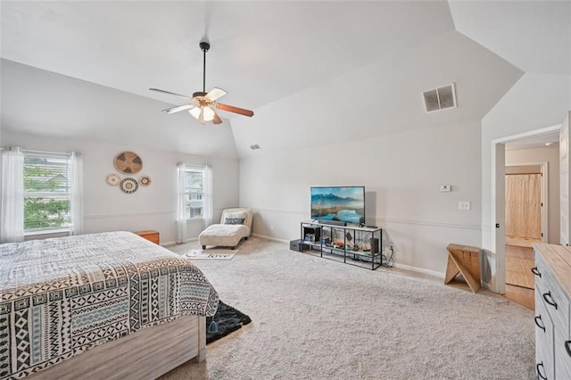 7530 Springbox Dr, Fairburn, GA 30213 - bedroom featuring lofted ceiling, carpet flooring, multiple windows, and a ceiling fan