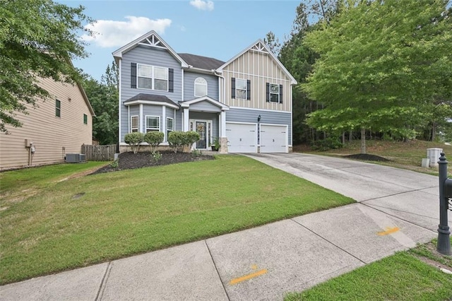 7530 Springbox Dr, Fairburn, GA 30213 - view of front of property featuring board and batten siding, an attached garage, and driveway