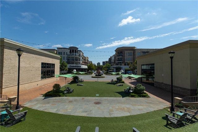 surrounding community featuring a patio