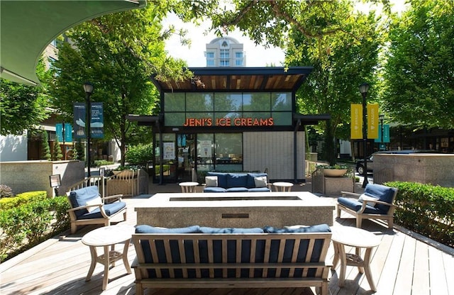 view of patio / terrace with a deck and outdoor lounge area