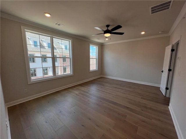 unfurnished room featuring ornamental molding, dark hardwood / wood-style flooring, and ceiling fan