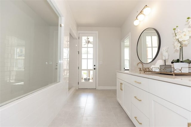 bathroom featuring vanity and tile flooring