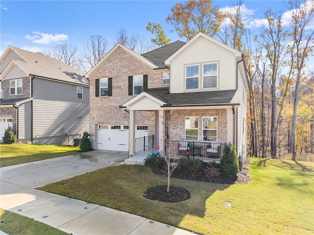 view of front of home with cooling unit, a front lawn, a porch, and a garage