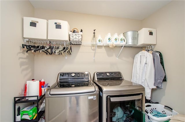 laundry area featuring laundry area and separate washer and dryer