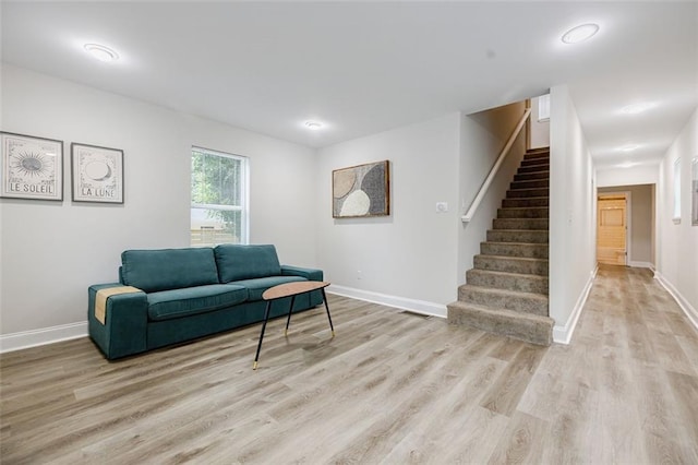 sitting room with light hardwood / wood-style flooring