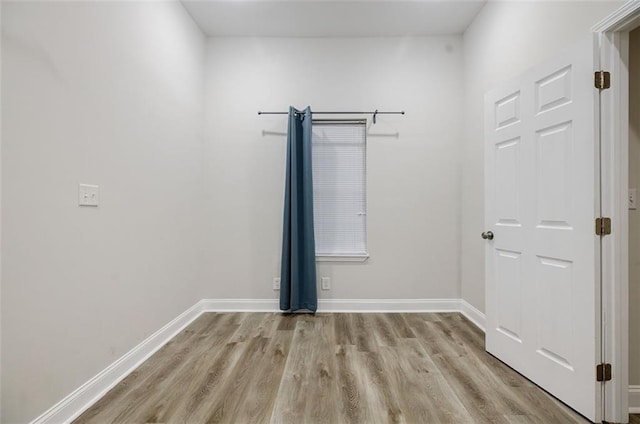 empty room with light wood-type flooring