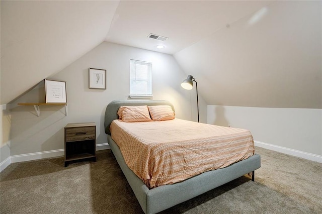 carpeted bedroom featuring vaulted ceiling