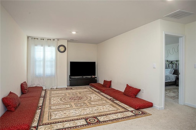 3469 English Elm Way, Loganville, GA 30052 - living room featuring carpet, baseboards, and visible vents