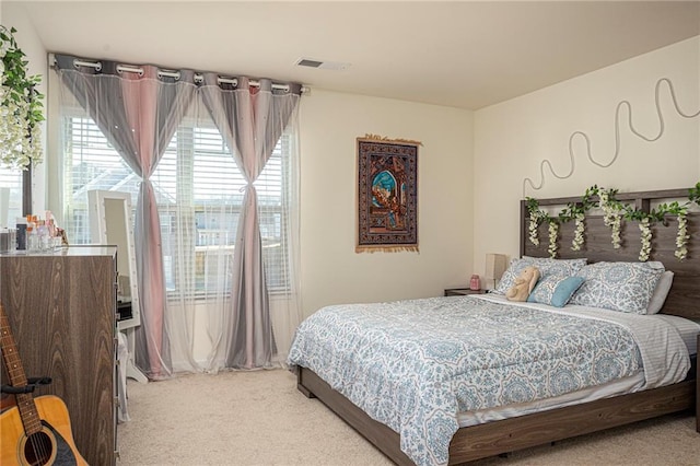 3469 English Elm Way, Loganville, GA 30052 - carpeted bedroom featuring visible vents and multiple windows