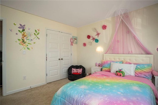 3469 English Elm Way, Loganville, GA 30052 - bedroom with baseboards, a closet, and carpet flooring