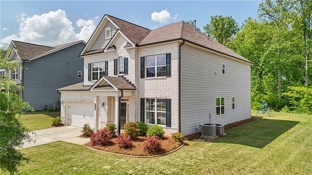 traditional-style home with brick siding, a shingled roof, a front lawn, and concrete driveway