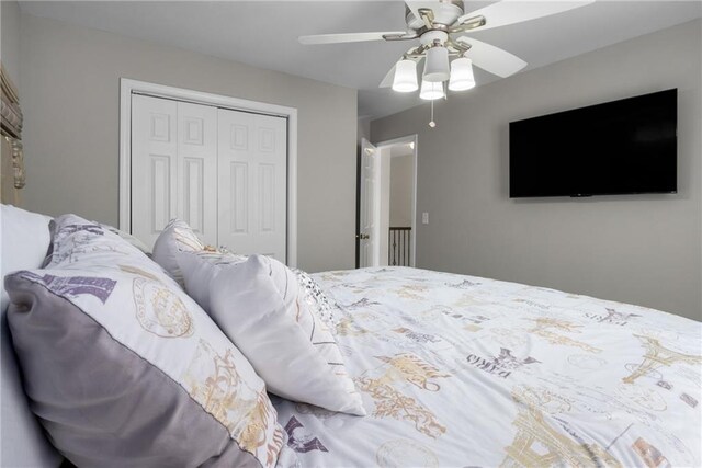 bedroom with a closet and a ceiling fan