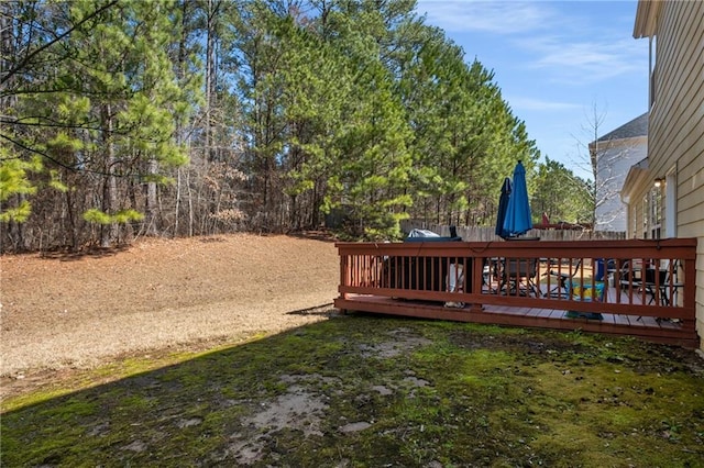 view of yard featuring a wooden deck