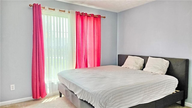 2233 Hansford Pass, Buford, GA 30519 - bedroom with baseboards and carpet floors