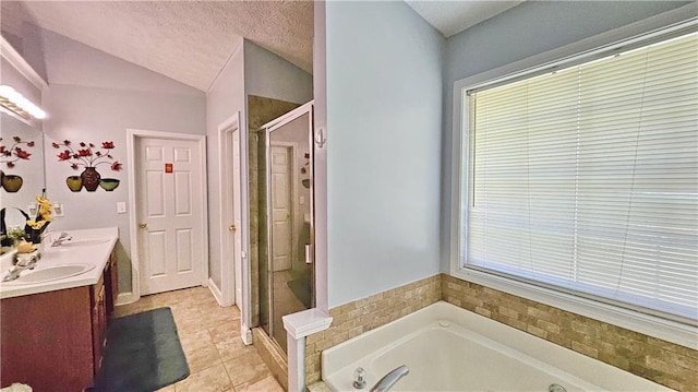 2233 Hansford Pass, Buford, GA 30519 - full bathroom featuring double vanity, a stall shower, a jetted tub, tile patterned floors, and lofted ceiling