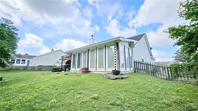 2233 Hansford Pass, Buford, GA 30519 - back of property with a fenced backyard and a chimney