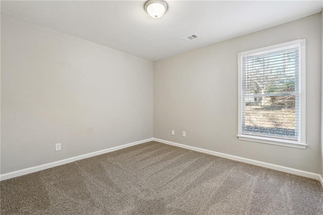 20 Trace Ct, Covington, GA 30016 - carpeted spare room featuring plenty of natural light and baseboards