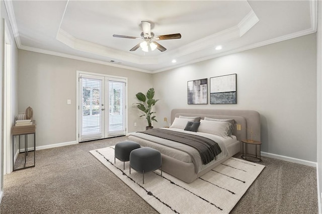 20 Trace Ct, Covington, GA 30016 - bedroom featuring access to exterior, a tray ceiling, carpet floors, ornamental molding, and french doors