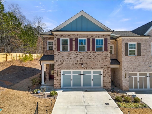 view of front of property with a garage