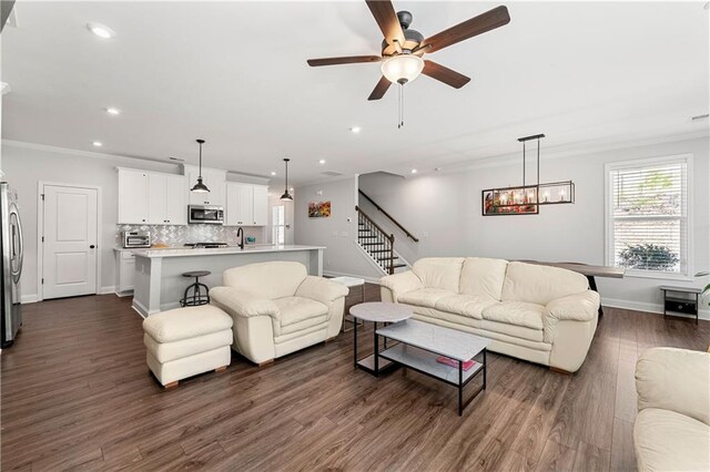 6240 Merrill View Ln, Alpharetta, GA 30004 - living room with ceiling fan, ornamental molding, sink, and dark hardwood / wood-style flooring