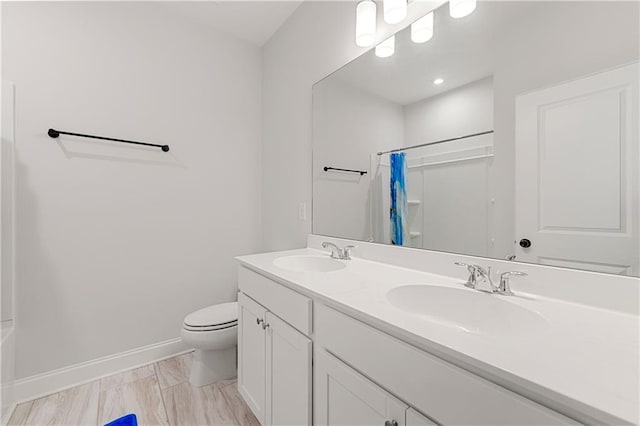 6240 Merrill View Ln, Alpharetta, GA 30004 - full bathroom featuring shower / bathtub combination with curtain, vanity, and toilet