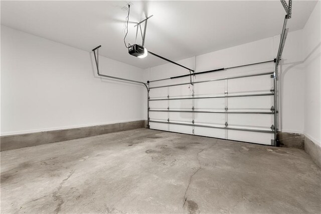 6240 Merrill View Ln, Alpharetta, GA 30004 - garage featuring a garage door opener