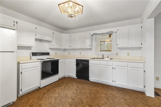 kitchen featuring parquet floors, a textured ceiling, white appliances, sink, and white cabinets