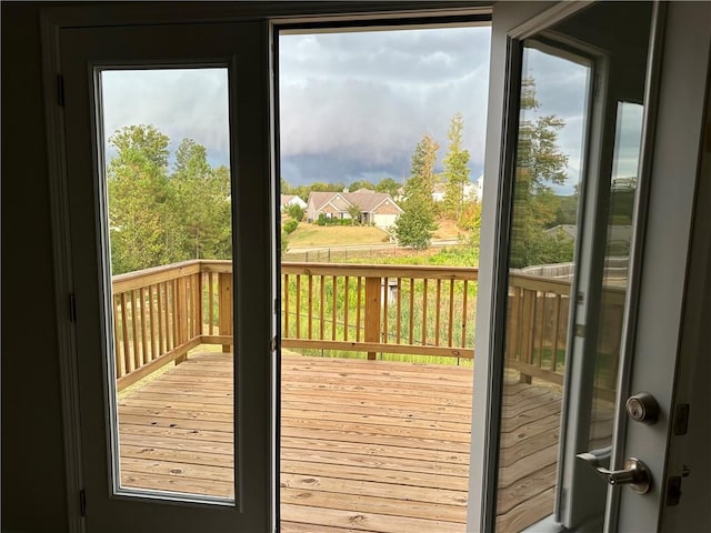 doorway to outside featuring hardwood / wood-style flooring