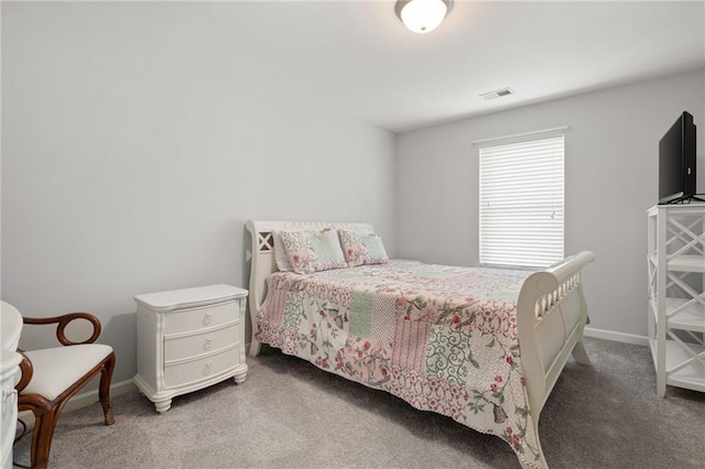 bedroom with visible vents, baseboards, and carpet flooring