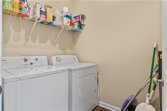 663 Wheeler Rd, Demorest, GA 30535 - washroom with baseboards, separate washer and dryer, and laundry area