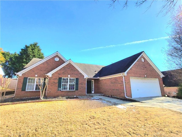 single story home featuring a front yard and a garage