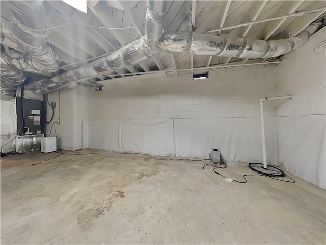 basement featuring heating unit