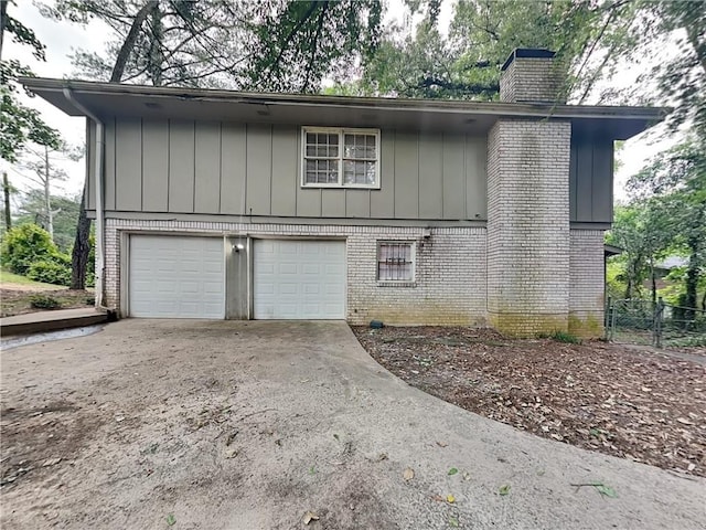 view of property exterior with a garage