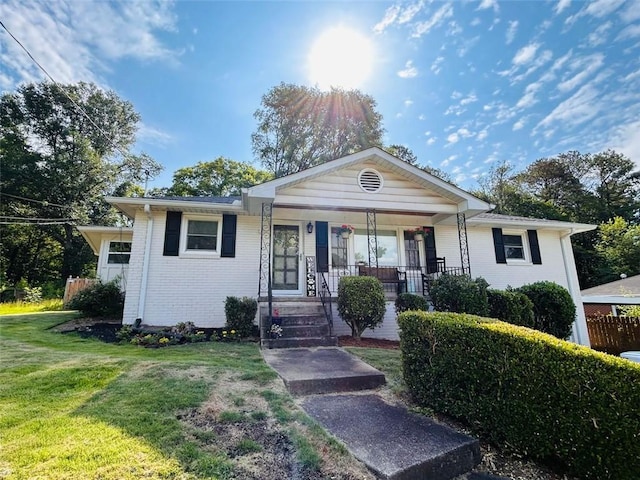 3215 Woodview Dr SE, Smyrna, GA 30082 - single story home with a front lawn, brick siding, and covered porch
