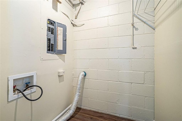 laundry room featuring hardwood / wood-style floors, hookup for a washing machine, and electric panel