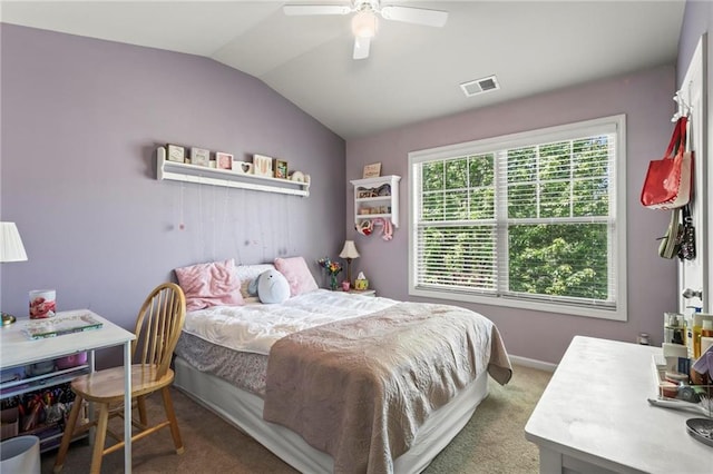 bedroom featuring lofted ceiling, visible vents, carpet floors, and ceiling fan