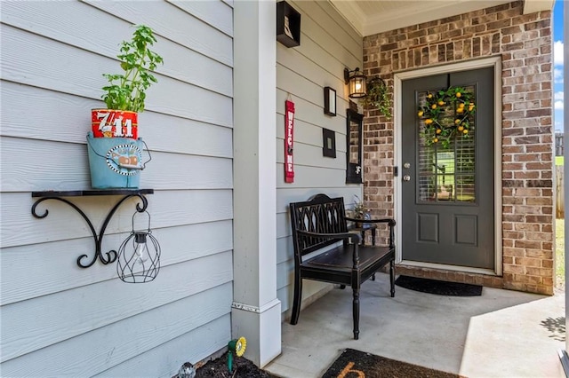 doorway to property with a porch