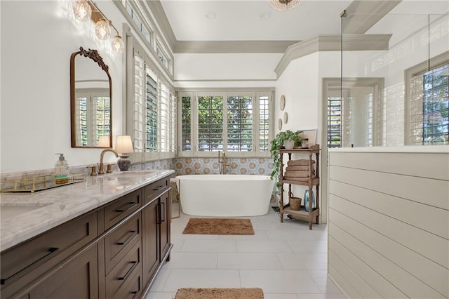 bathroom featuring vanity, tile walls, plenty of natural light, and tile patterned floors